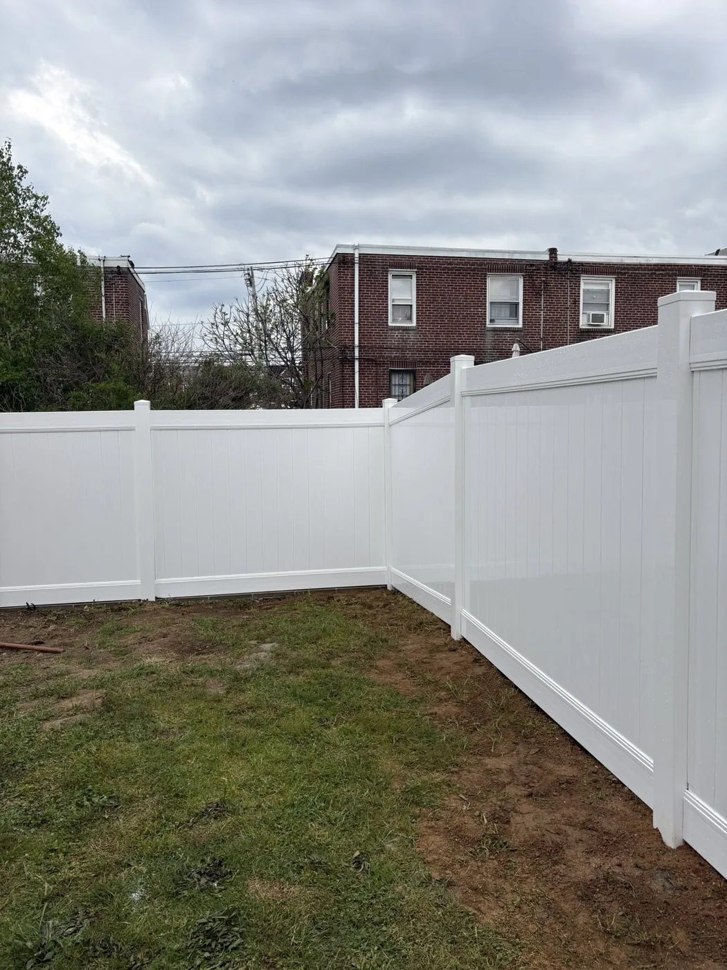 White vinyl privacy fence corner