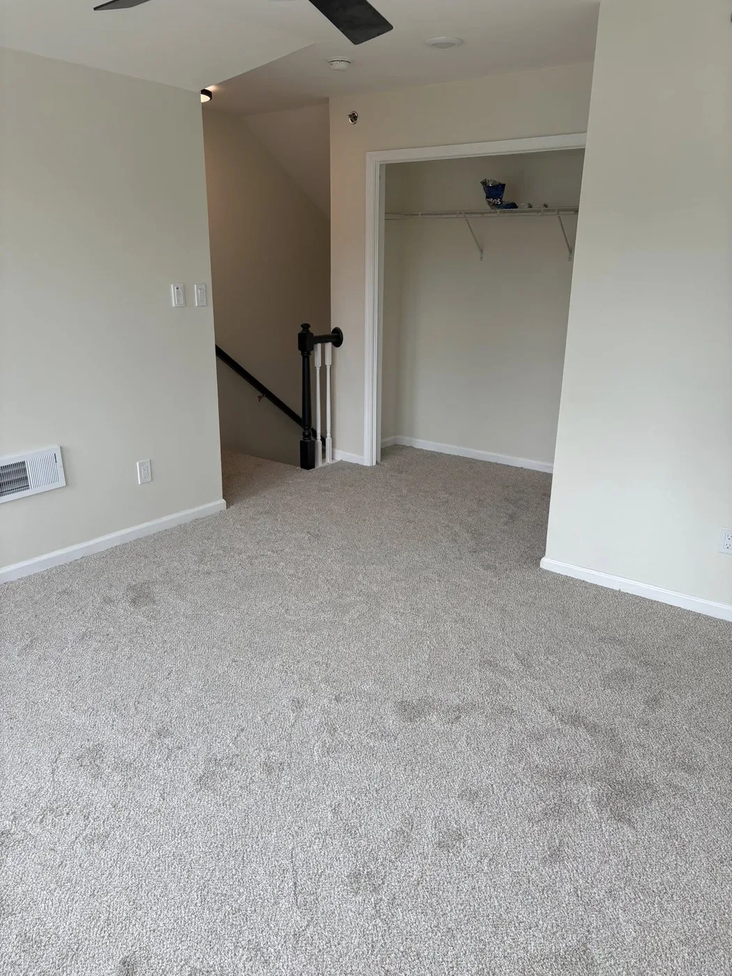 Whole-room carpet install in a finished living room