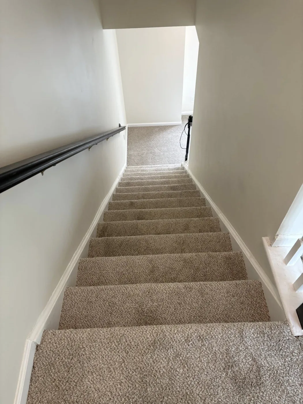 Beige carpet stair run
