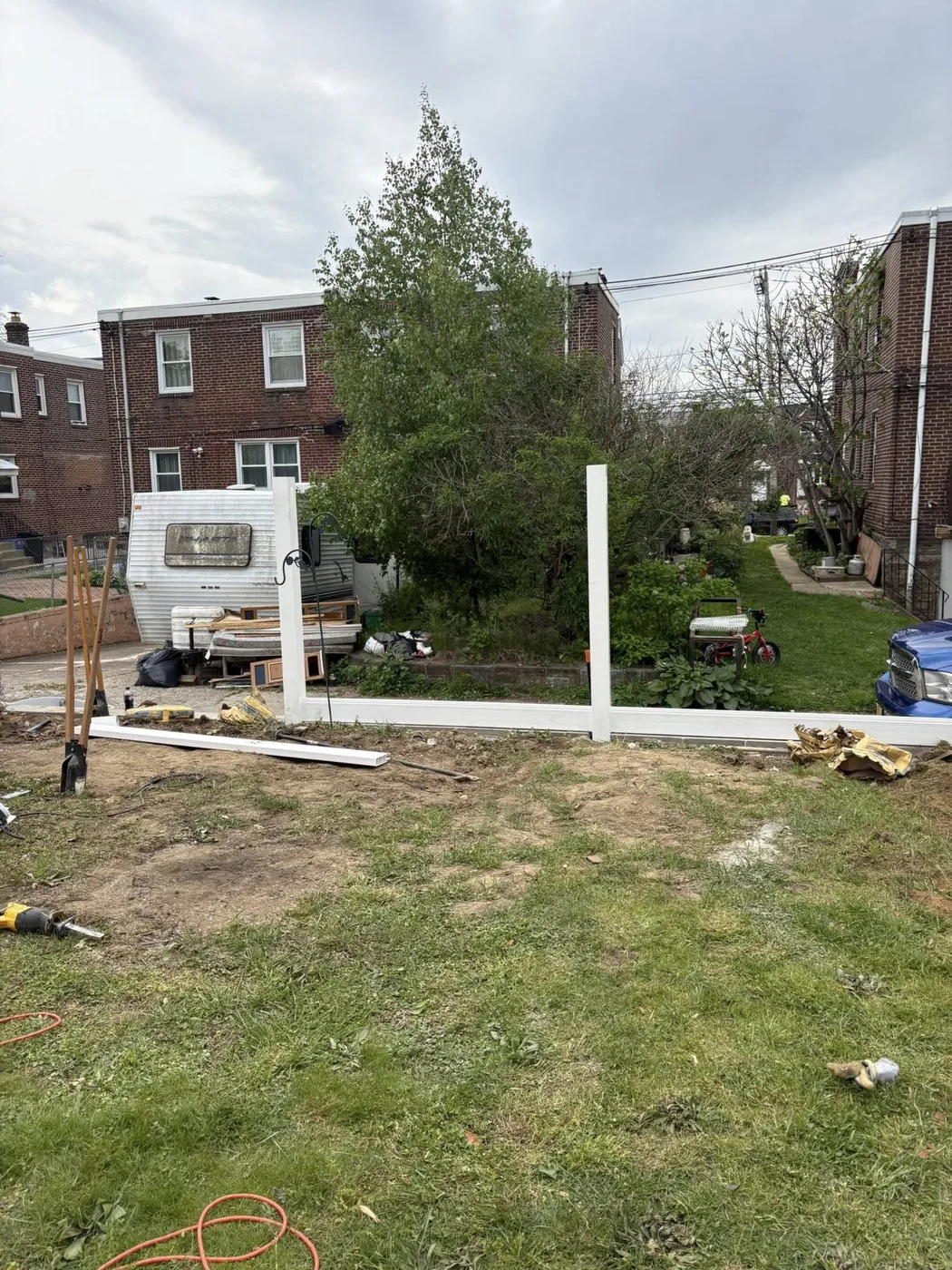 White vinyl privacy fence section install